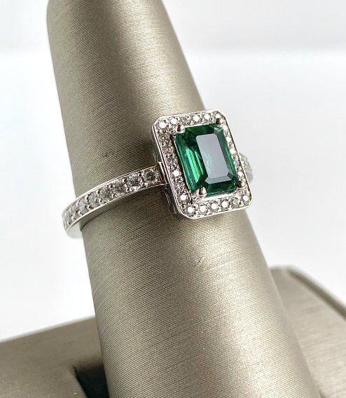 Emerald With Diamond Halo Ring