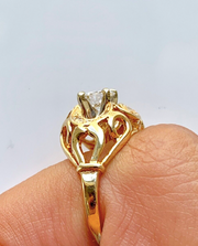 0.50ct Round Brilliant Diamond Ring in 14K Gold
Vintage elegance with a sparkling center and ten accent diamonds—refined and timeless.