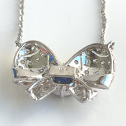 Natural 0.85 CT Sapphire Center Stone with Natural 0.50 CTW Diamond Bow 18K White Gold Pendant and 14K White Gold Chain