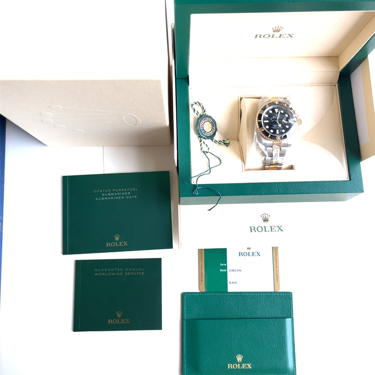 Pre-owned Rolex Submariner watch Date 18K Yellow Gold/Steel Black Dial 116613LN with original box and papers