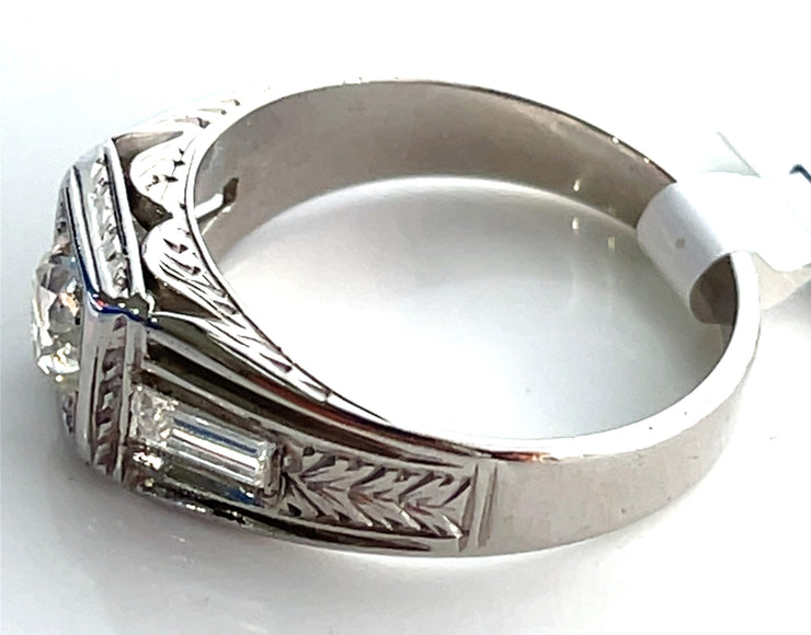 0.22ctw tapered baguette side diamonds for elegant detail.