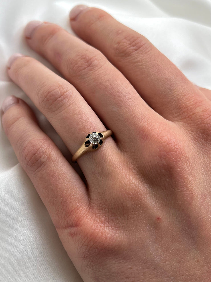 Worn on hand to show scale and the ring’s understated, historic beauty.

