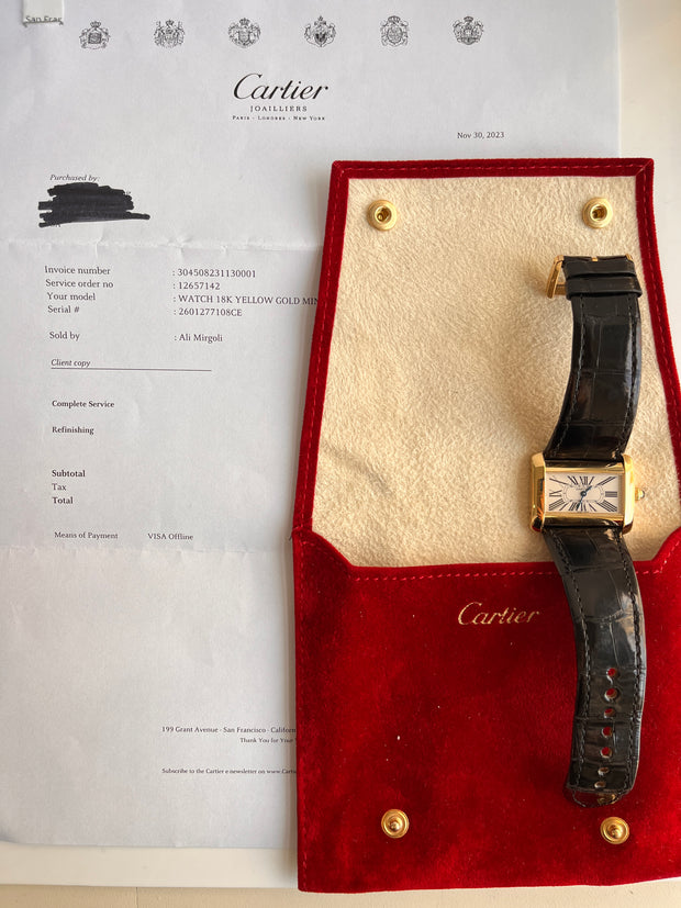 Details of service paper, original pouch and watch.