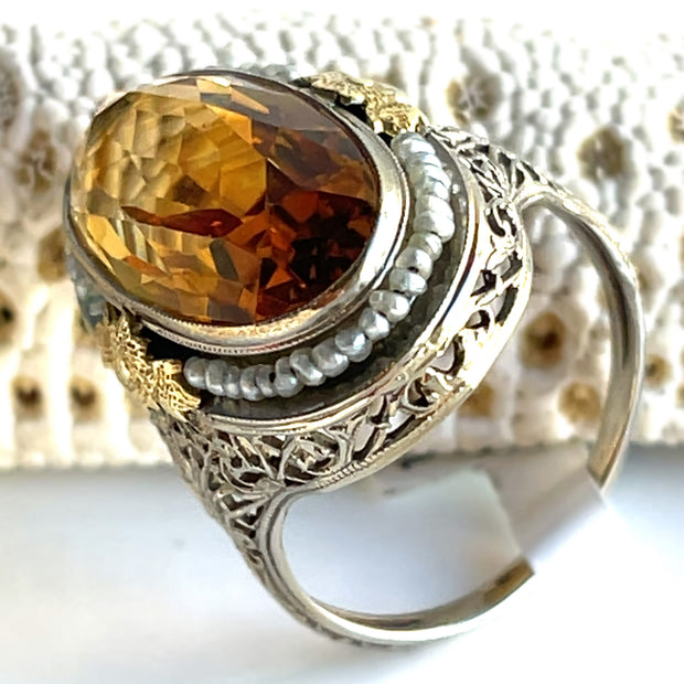 Heirloom Citrine and Pearl Ring in 14K -
Stunning 6.25ct oval citrine surrounded by seed pearls, absolute vintage charm.