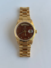 Gold Rolex from 1989 with rare Burl wood dial.