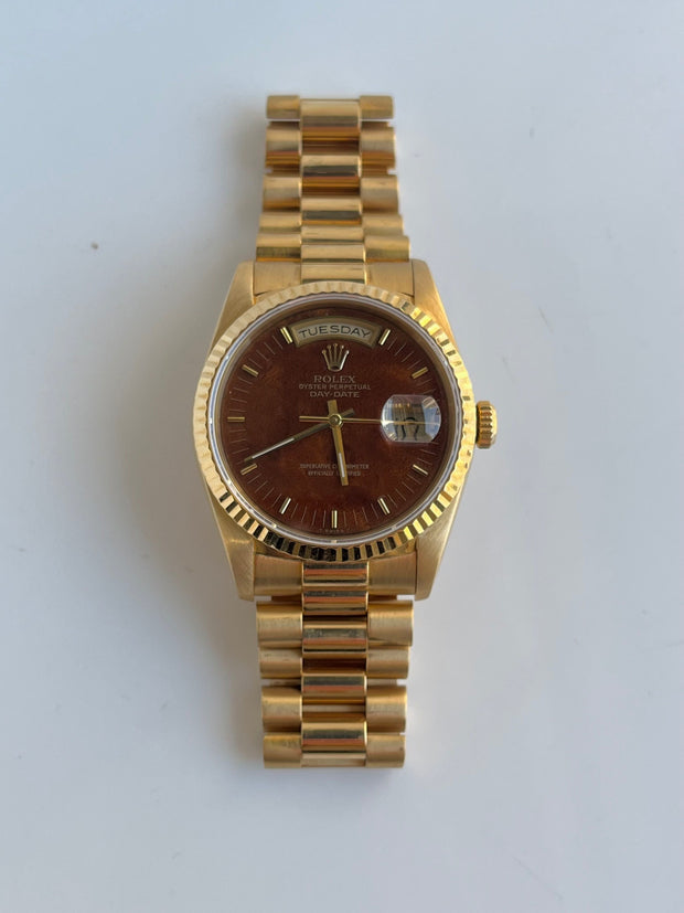 Gold Rolex from 1989 with rare Burl wood dial.