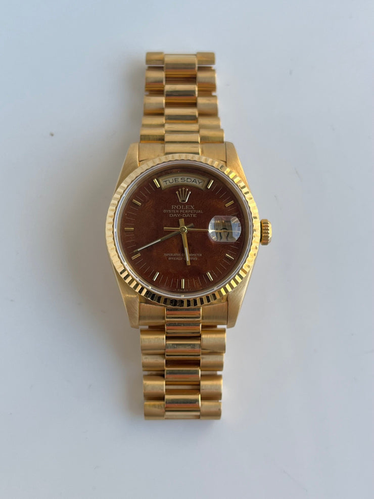 Gold Rolex from 1989 with rare Burl wood dial.