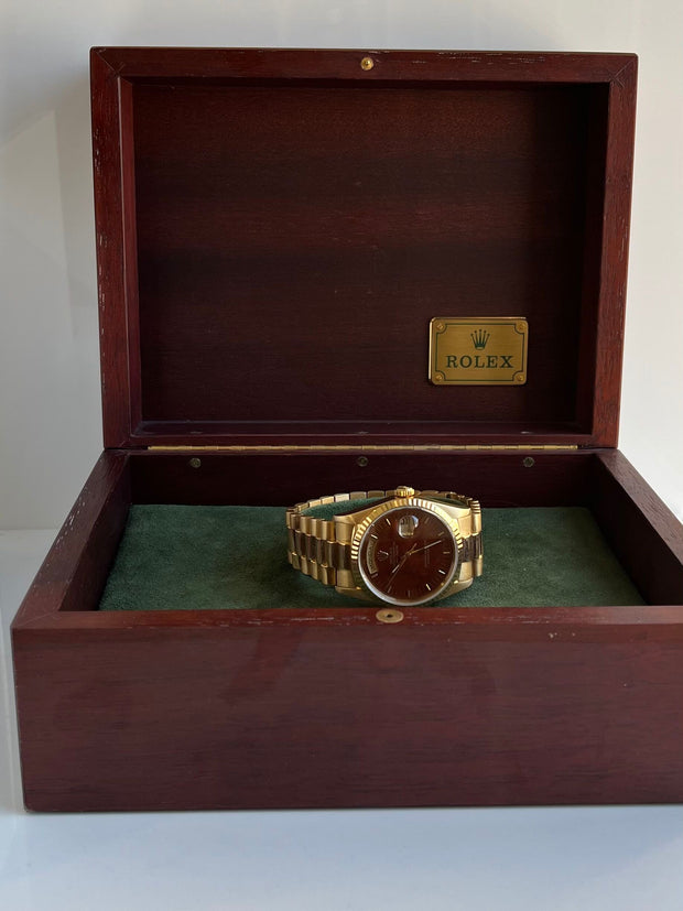 Rolex with original box.