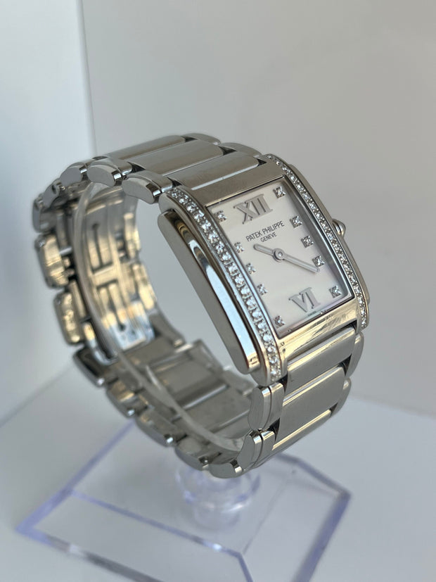 Shown here the angled profile showcasing the natural diamond markers and bezel.