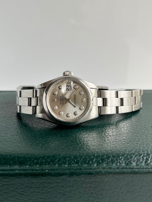 The diamond dial Rolex shown in detail.