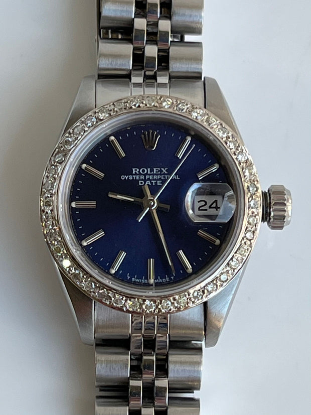 Iconi blue dial and diamond bezel.