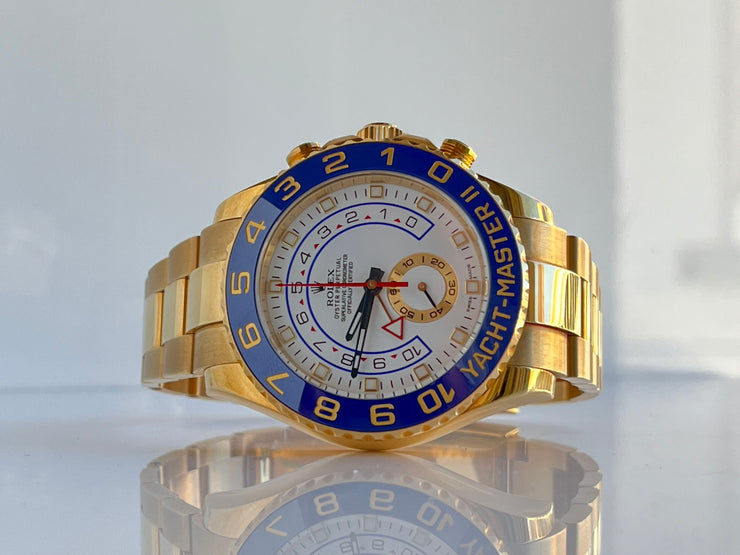 A straight on look at the white dial and blue ceramic bezel.