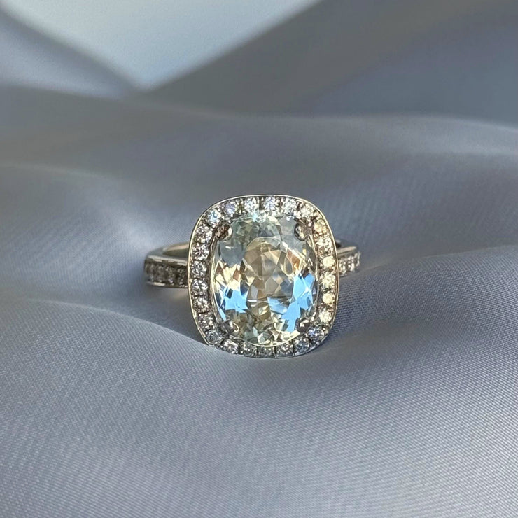 Beautiful Retro Natural Aquamarine and Diamond Ring worn on a hand, highlighting its elegant size and sparkling stones