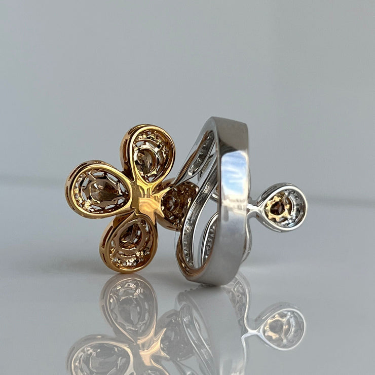 Back view of flower-inspired diamond ring in 18K rose and white gold with chocolate pear diamonds and brilliant white stones.
