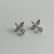 Back side of diamond stud earrings featuring marquise-cut stones on white background