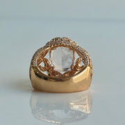 Back side of elegant Morganite and diamond halo ring