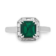 A view from the front showcasing the 1.23 carat vibrant emerald.