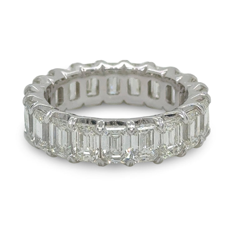 Emerald Cut Diamond Eternity Band in 18K white gold, featuring a continuous line of 6.3 carats of stunning emerald-cut diamonds.