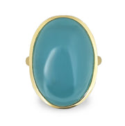 Elegant 18k yellow gold ring featuring a stunning 23.98ct oval cabochon of Aquamarine in a high polished bezel