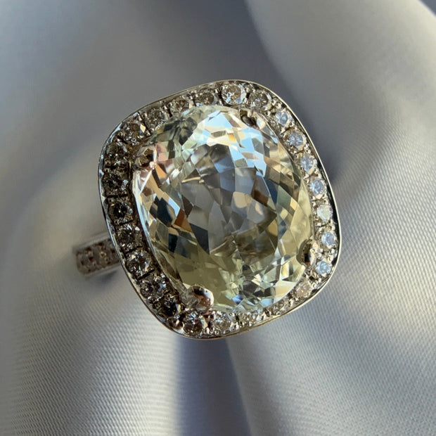 Retro Natural Aquamarine and Diamond Ring displayed against a neutral background, emphasizing the vibrant blue aquamarine and sparkling diamonds