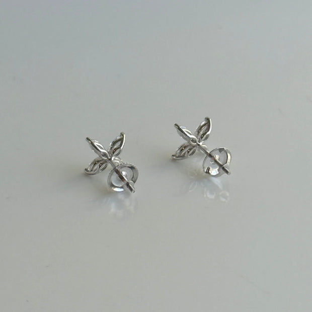 Back of marquise diamond flower earrings in white gold setting