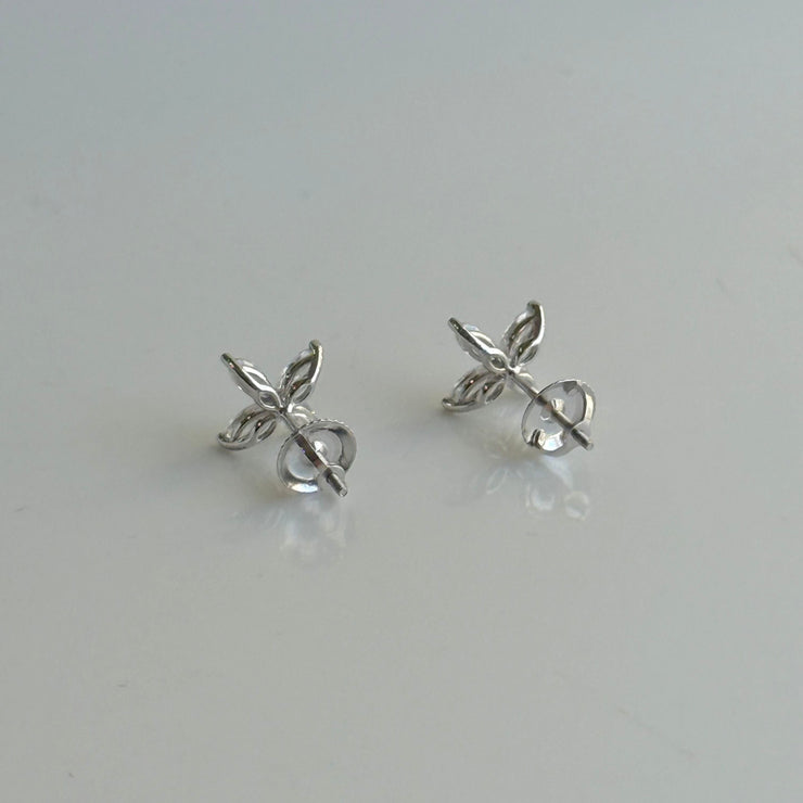 Back of marquise diamond flower earrings in white gold setting