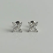 Detailed view of 1.34 CTW marquise diamond stud earrings with certification
