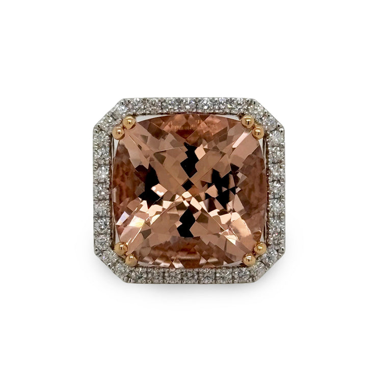 Blush brown-toned 14.14 carat morganite with diamond halo in rose gold double prong setting
