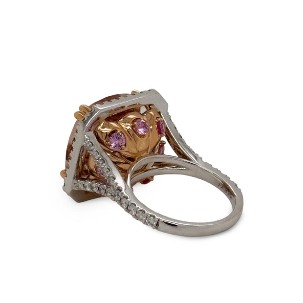 18K rose and white gold ring with pavé diamonds and pink sapphire details beneath 14.14 ct morganite.