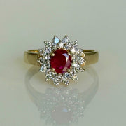 Oval Ruby Ring with Double Diamond Halo
