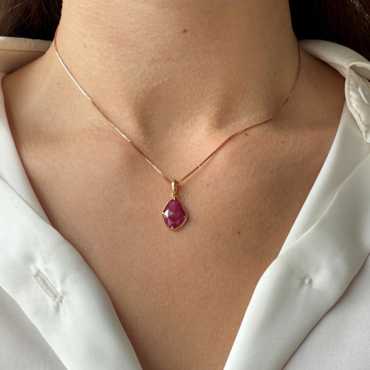 Luxury ruby slice pendant featuring 1.91ctw untreated rubies set in 18K on model