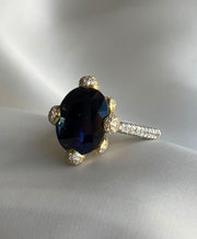 Two Tone Oval Cut Sapphire with Diamonds Ring