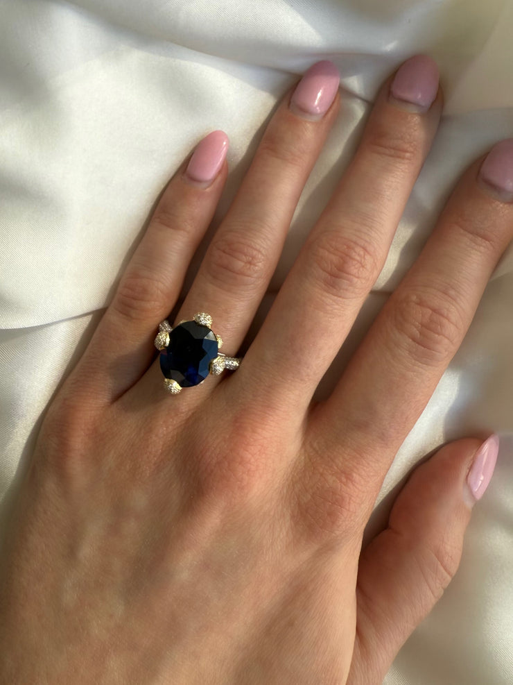 Two Tone Oval Cut Sapphire with Diamonds Ring