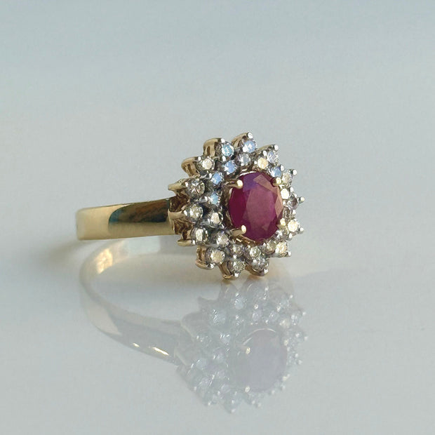 Oval Ruby Ring with Double Diamond Halo