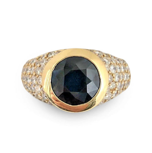 Vintage 14K yellow gold ring with 2.60 carat natural blue sapphire and 1.35 carats of round brilliant diamonds.