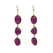 Luxury ruby slice drop earrings featuring untreated rubies and gold setting