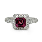 Asscher-cut pink tourmaline ring with pavé diamond halo in fine setting