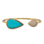18K yellow gold open arm cuff with pear-shaped  turquoise and pavé-set round diamonds.