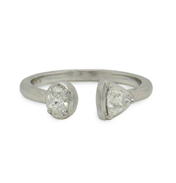 Bypass ring in 18K white gold featuring oval and trillion cut diamonds