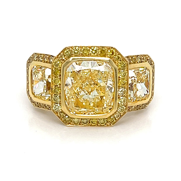 Yellow Diamond Three Stone Halo Ring