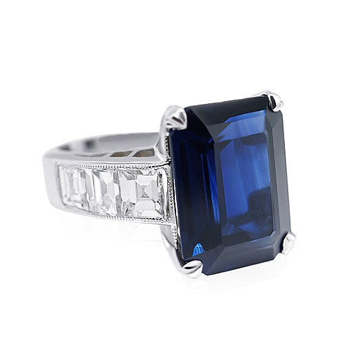 Emerald cut sapphire and diamond ring