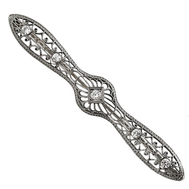 A refined antique vintage brooch, elegantly designed and beautifully set.