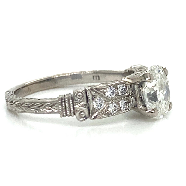 Antique 1.00 ct Oval Center Stone with 0.15 ctw  Diamond Band set in 18k White Gold