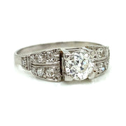 Antique Ring with Approximately 0.80 ct Round Diamond Center Stone and 0.30 ctw Side Diamonds set in Platinum