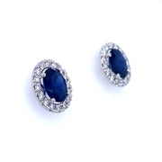 4.20 ctw Oval Sapphire with 0.65 ctw Diamond Halo Stud Earrings set in 18k White Gold