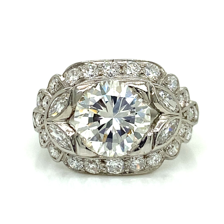 A bold center stone with soft vintage sparkle.