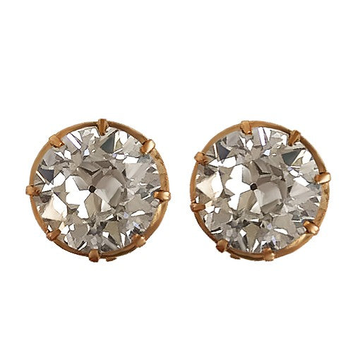A timeless pair featuring antique diamonds in crown-style settings with secure screw backs—elegant, rare, and heirloom-worthy.

