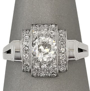 Front view close up showing the 0.90ct center diamond framed by single cut accents.