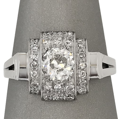 Front view close up showing the 0.90ct center diamond framed by single cut accents.