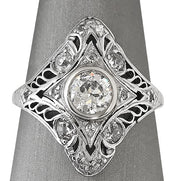 Close-up of the pavé-set diamonds and clean band, emphasizing the refined silhouette.